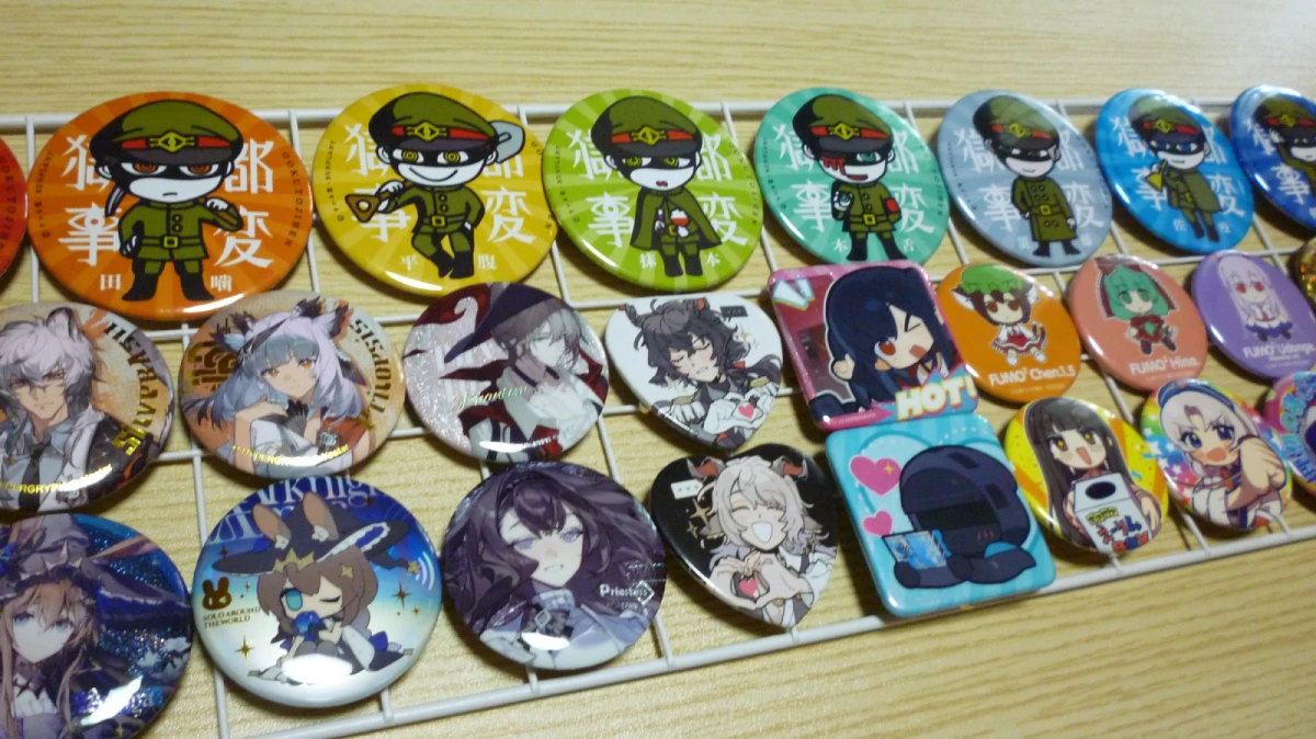 Organized badges on a metal rack, secured with magnets